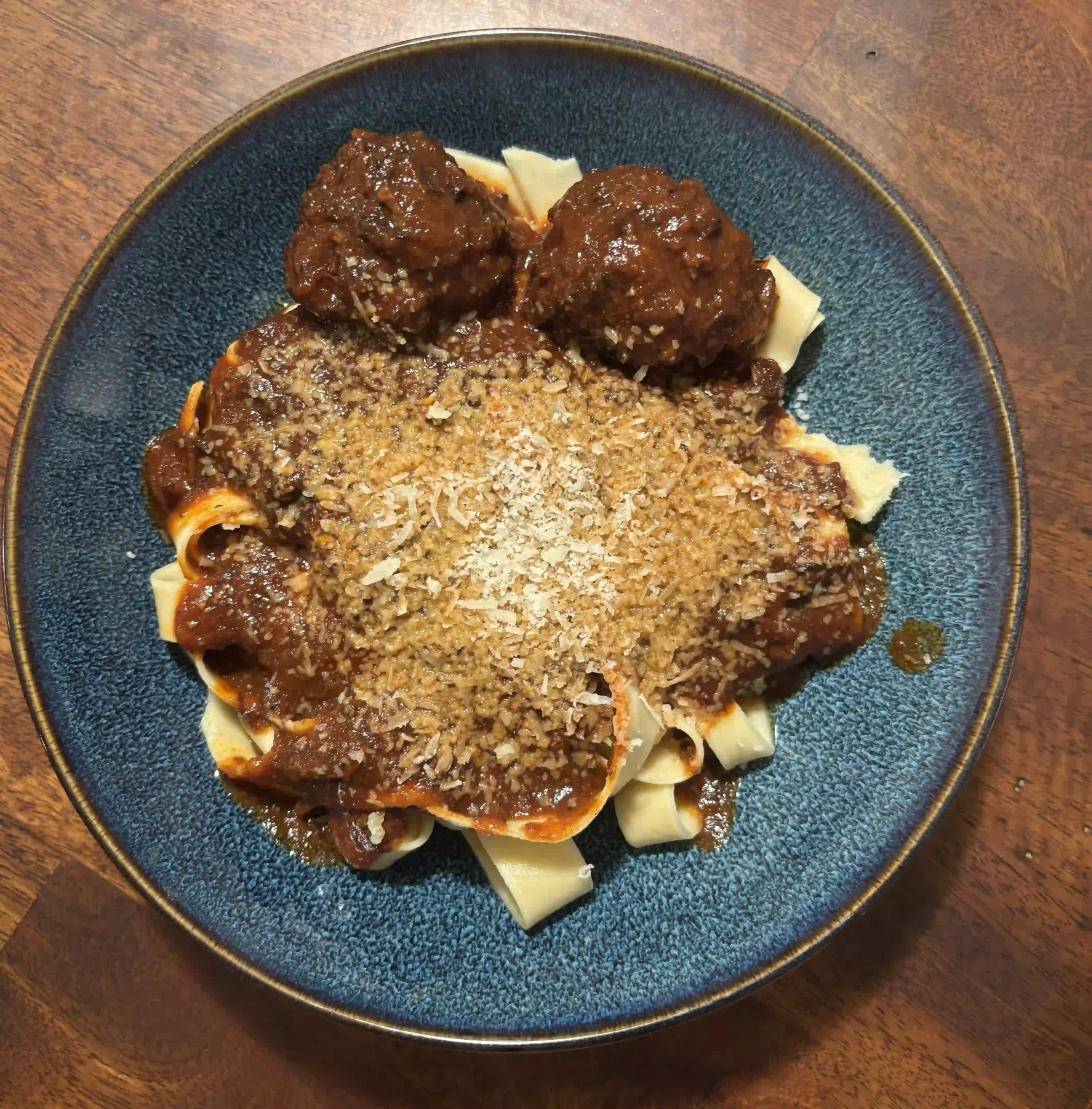 Fresh Pappardelle with Meatballs and Red Sauce homemade pappardelle with meatballs and red sauce close look
