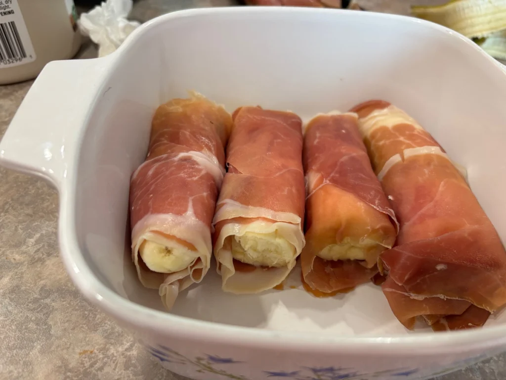 serrano ham wrapped bananas with gruyère ham roll