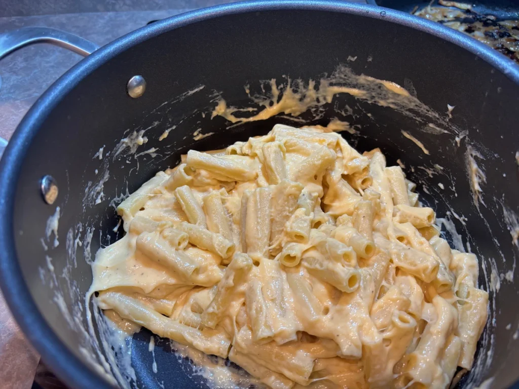 calabrian chili ziti mac and cheese. add pasta