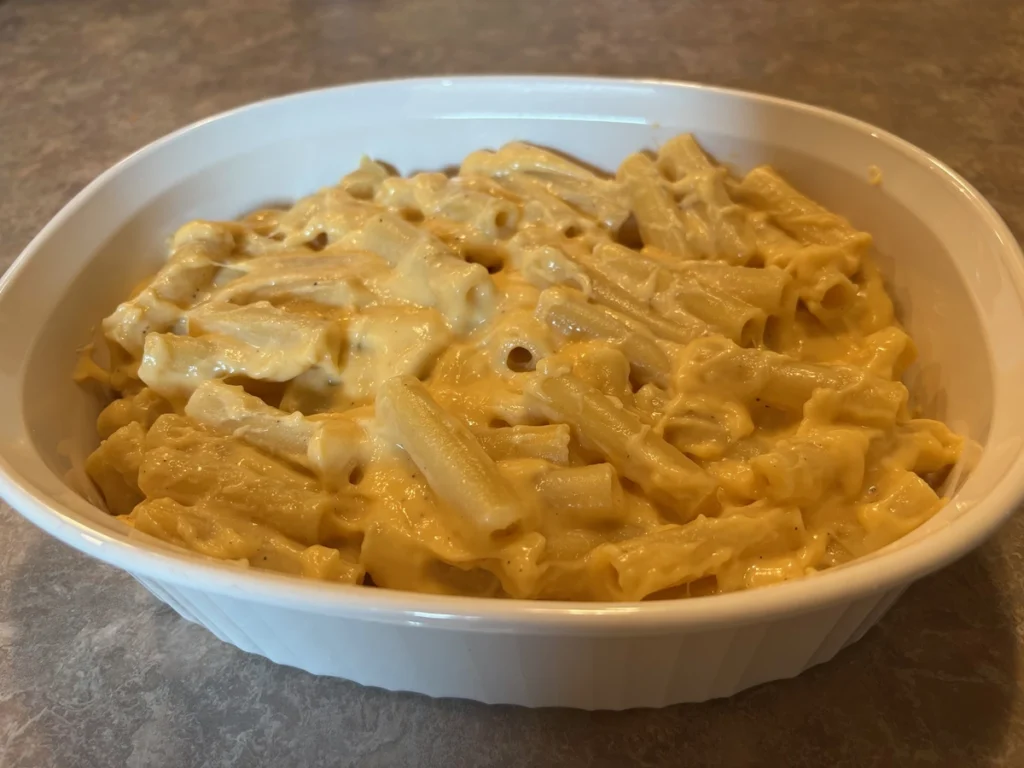 calabrian chili ziti mac and cheese. transfer dish